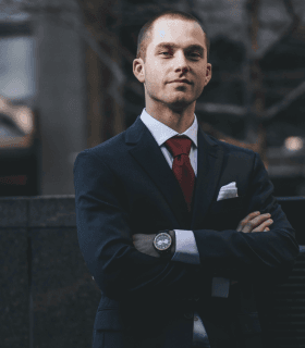 Confident man portraying a car shipping broker