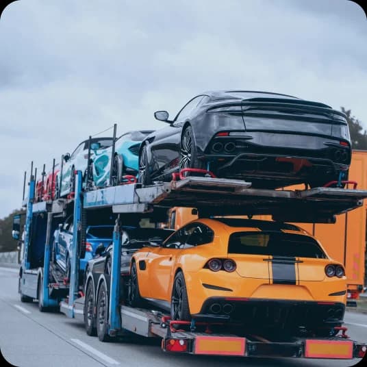 Many exotic cars on a car carrier