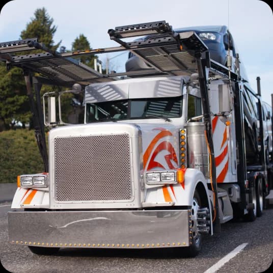 A carrier front view with vehicles