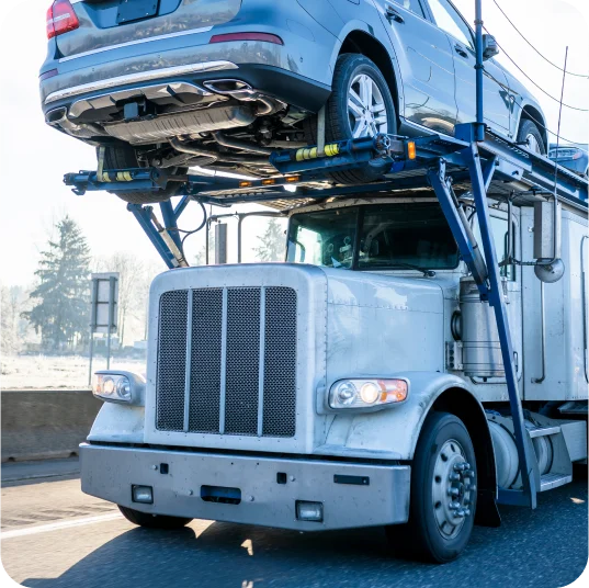 Car hauler front view while in transit